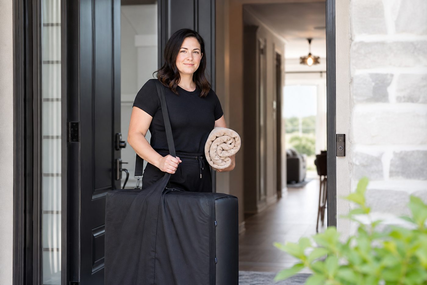Mobile massage practitioner arriving for an appointment